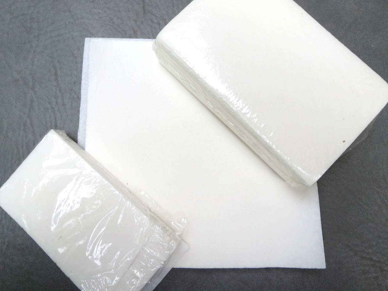 #02-01282CG13 DriMop® Absorber/Solidifier 4-1/4` x 2-1/4` Laminated Paper Sheets